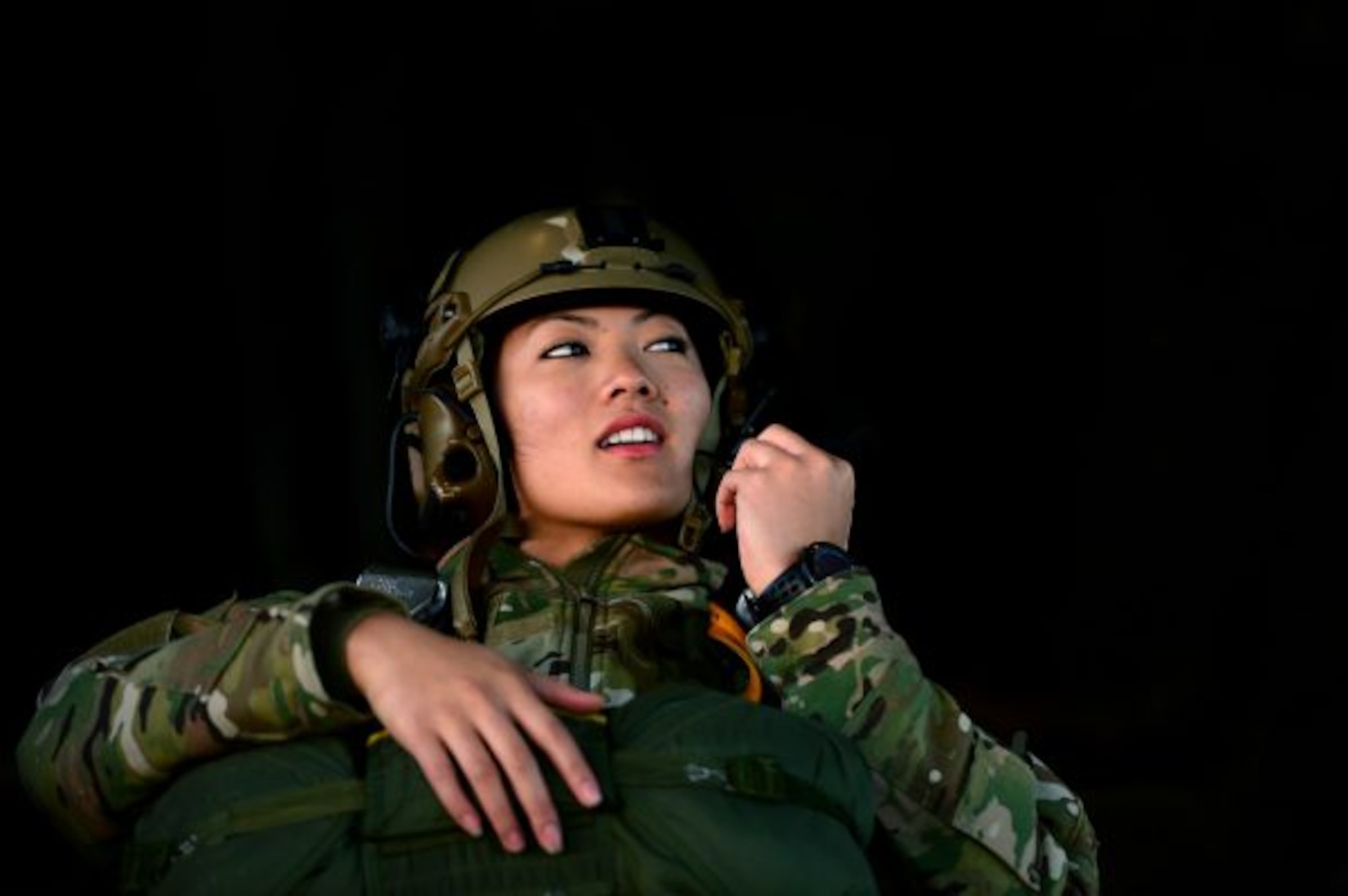 Senior Airman Kristin Listien, a physiology technician (PT) assigned to the 19th Aerospace Medicine Squadron High Altitude Airdrop Mission Support Center (HAAMSOC), Little Rock Air Force Base, Ark., prepares for a static-line parachute jump, Nov. 16, 2016. Listien is part of the HAAMS mission where Airmen are specially trained to provide in-flight physiological support to aircrews, special operations forces, high-altitude parachutists, and other DoD agencies that perform unpressurized airdrop operations at 20,000 feet mean sea level and above. (U.S. Air Force photo/Staff Sgt. Kenny Holston)