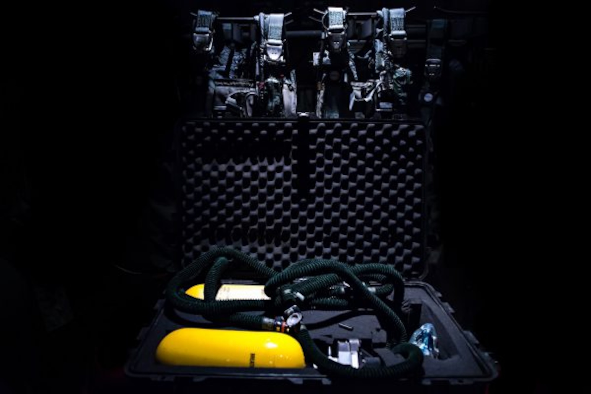 A mobile oxygen system kit sits onboard a C-130J Hercules during the preflight preparation of a high altitude training mission at Little Rock Air Force Base, Ark. on Nov. 16, 2016. The Oxygen system pictured is an integral piece of safety equipment that mitigates hypoxia. (U.S. Air Force photo/Tech. Sgt. Brandon Shapiro)