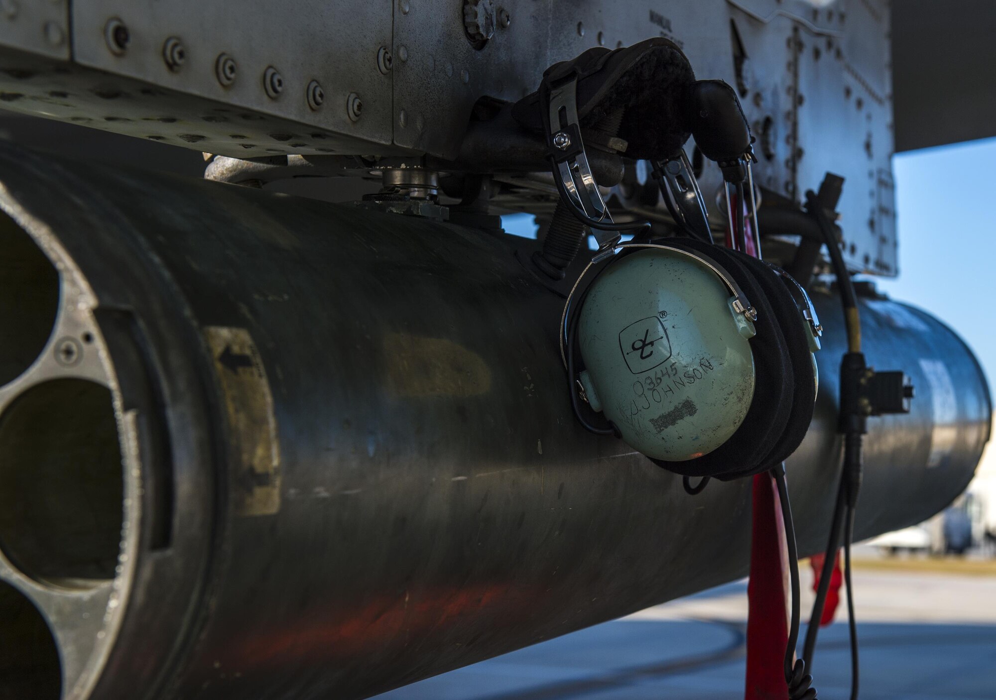 A headset hangs under the wing of an A-10C Thunderbolt II, Jan. 12, 2017, at Moody Air Force Base, Ga. The A-10C provides close air support when Airmen are downrange and during realistic training exercises. (U.S. Photo by Airman 1st Class Janiqua P. Robinson)