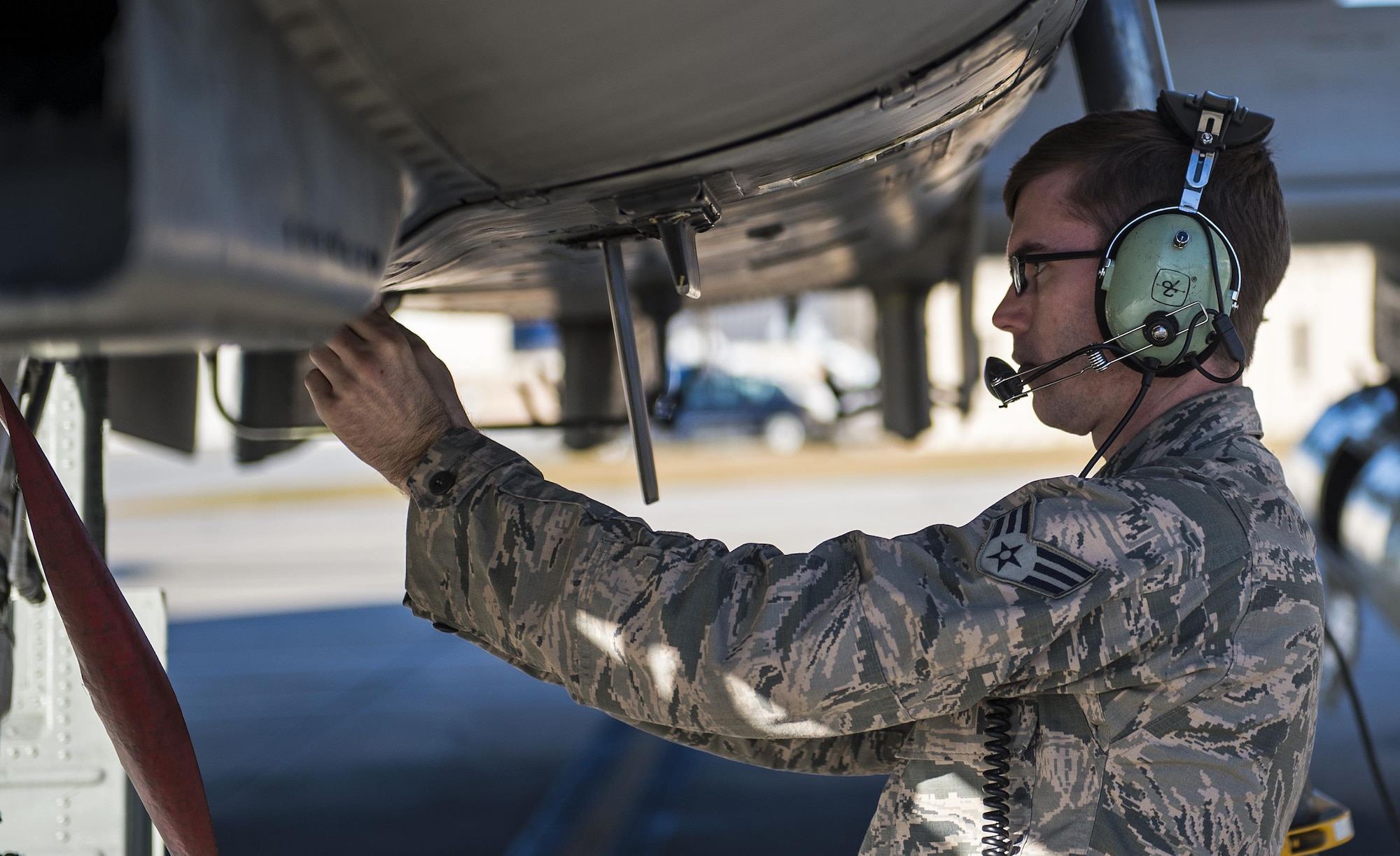Senior Airman John Johnson, 23d Aircraft Maintenance Squadron crew chief, performs a pre-flight inspection on an A-10C Thunderbolt II, Jan. 12, 2017, at Moody Air Force Base, Ga. Pilots, aircraft and maintainers traveled to Nellis Air Force Base in Las Vegas to participate in Green Flag-West. (U.S. Photo by Airman 1st Class Janiqua P. Robinson)