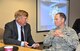 Former Assistant Secretary of the Air Force for Installations, Environment and Logistics Terry Yonkers (left) discusses the Enhanced Use Lease program with 377th Air Base Wing Commander Col. Eric Froehlich Jan 11 during the Industry Day at Phillips Technology Institute here. Yonkers is representing a private-sector group interested in leasing land on Kirtland Air Force Base's
Gibson corridor. (USAF photo by Jim Fisher)
