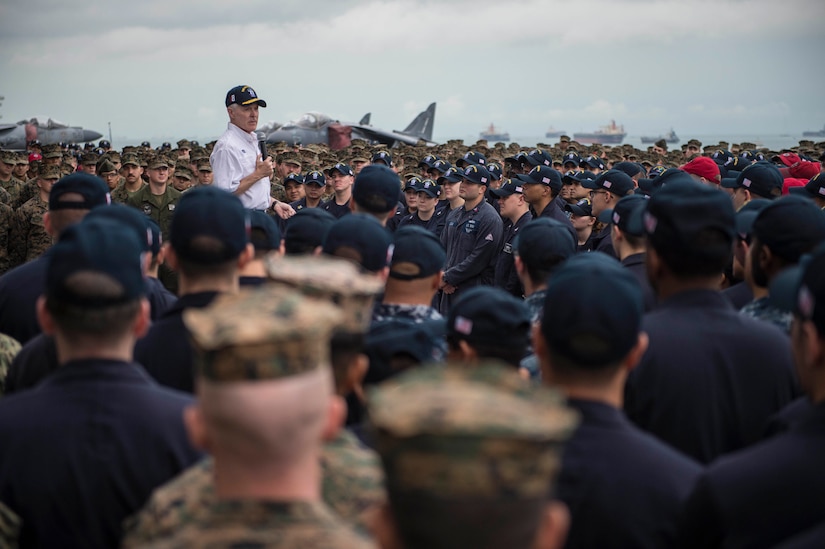 Navy Secretary Ray Mabus speaks with sailors and Marines during an all-hands call on the flight deck aboard the amphibious assault ship USS Makin Island in Singapore, Nov. 21, 2016. Mabus was visiting the Pacific and Central Command areas of responsibility to meet with sailors, Marines, and partner nation military and government officials. Navy photo by Lt. David Gardner