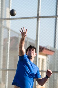 Staff Sgt. Bryan Nelson, 802nd Security Forces Squadron training NCO and Air Force wounded warrior, throws a shot put ball at Joint Base San Antonio-Randolph Jan. 11, 2017. Nelson is a participant in the Air Force Wounded Warrior (AFW2) Warrior Care week-long event, which aims to provide wellness events for seriously wounded, ill and injured military members, veterans and their caregivers. (U.S. Air Force photo by Airman 1st Class Lauren Parsons/Released)