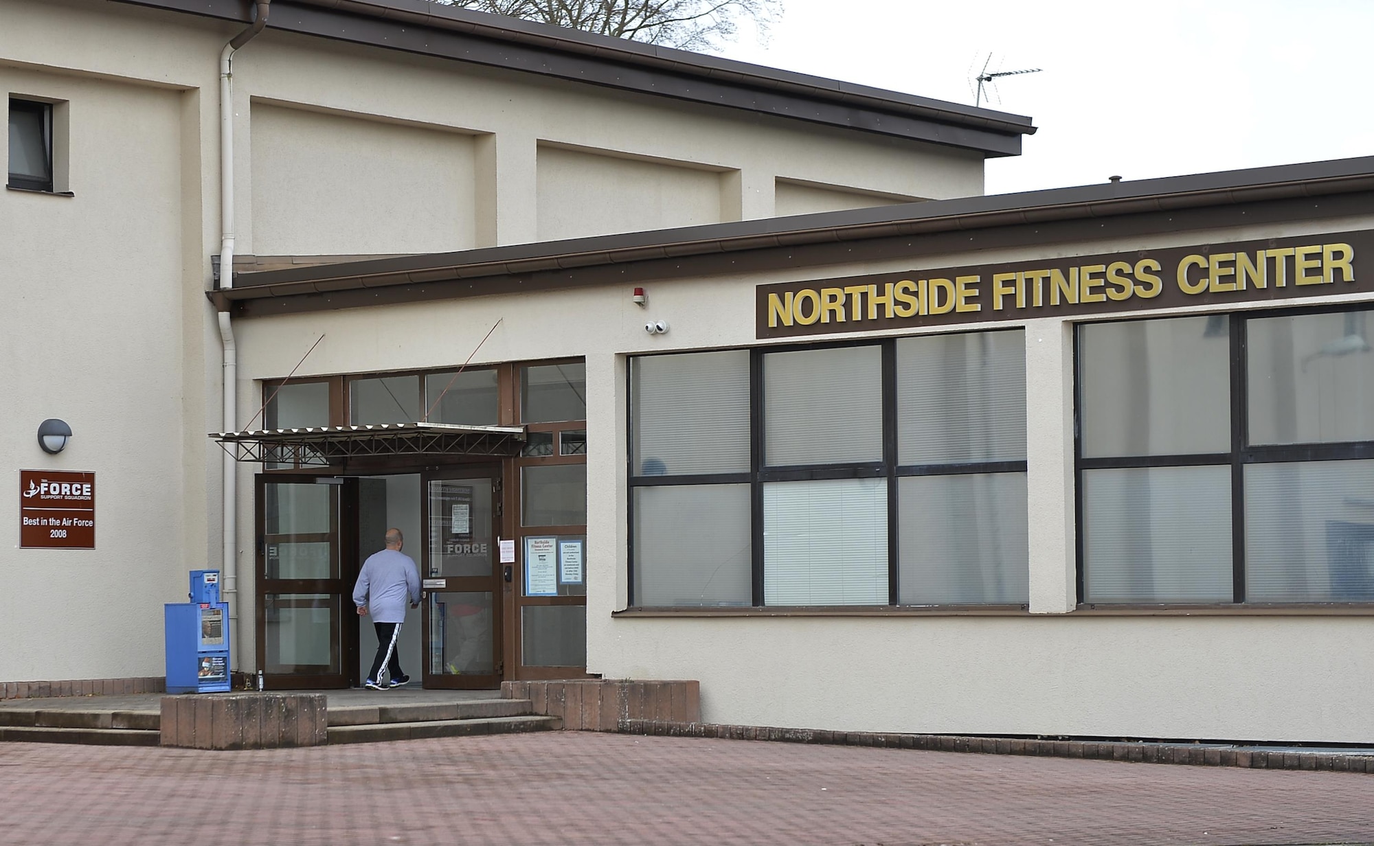 A Patron enters the Northside Fitness Center at Ramstein Air Base, Germany, Jan. 13, 2017. Despite renovations to some of its features, the facility remains open for its customers. (U.S. Air Force photo by Airman 1st Class Joshua Magbanua)