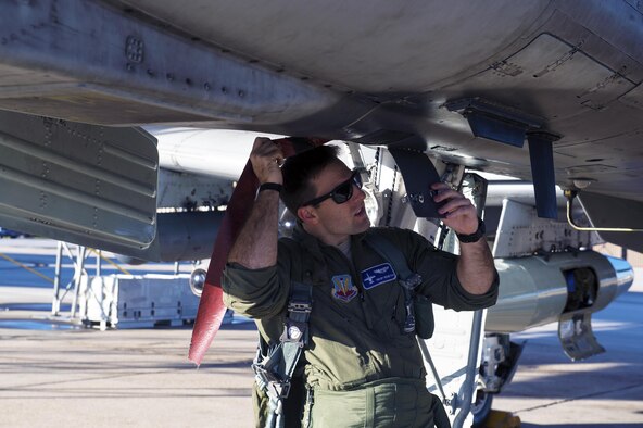 Capt. Andrew Nemethy, 74th Fighter Squadron A-10C Thunderbolt II pilot, performs a pre-flight inspection prior to launching for Green Flag-West, Jan. 12, 2017, at Moody Air Force Base, Ga. Pilots from the 74th FS will fly to Nellis Air Force Base, Nev. for two weeks to hone their joint interoperability with the U.S. Army to enhance their air-land integration capabilities. (U.S. Air Force photo by Airman 1st Class Greg Nash)