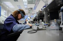 Beate Steinbacher, 86th Dental squadron dental lab technician, rough finishes pressed porcelain crowns at Ramstein Air Base, Germany, Jan. 11, 2017. The 14 personnel assigned to Ramstein’s area dental lab fabricate retainers, mouth guards, dentures, porcelain crowns, implants, and more for Airmen in 64 treatment facilities within U.S. Air Forces in Europe, United States Africa Command, and deployed locations in the region. (U.S. Air Force photo by Airman 1st Class Savannah L. Waters)