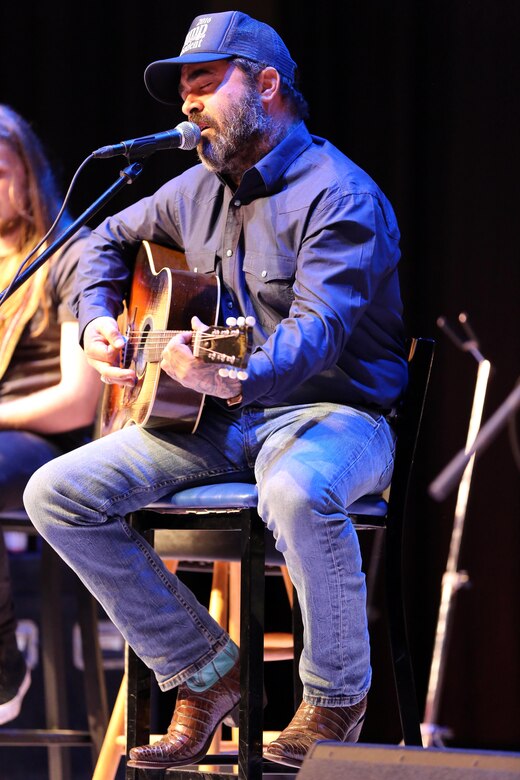 Aaron Lewis performs during the Cherry Point Unplugged concert aboard Marine Corps Air Station Cherry Point, N.C., Jan. 11, 2017. As an American musician and songwriter, he has performed numerous acoustic shows since he was 17 years old. “The most important thing that I can accomplish during the performance is to show the military members in the audience how much they are appreciated,” said Lewis. Over 1,200 Marines, sailors and members of the community packed the Two Rivers Theater to enjoy the free concert featuring artists such as Lewis; Citizen Zero; A Thousand Horses; and Seasons After. (U.S. Marine Corps photo by Cpl. Mackenzie Gibson/ Released)