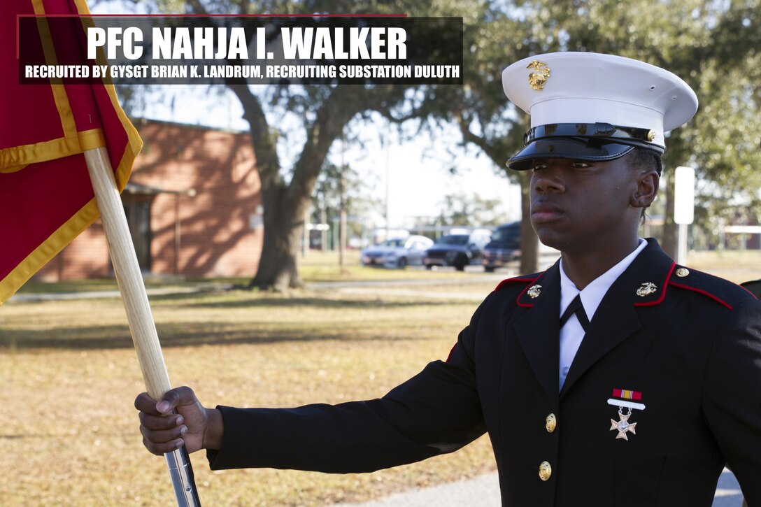 Private First Class Nahja I. Walker stands at parade rest before her graduation ceremony January 13, 2017, aboard Marine Corps Recruit Depot Parris Island, South Carolina. Walker is the Honor Graduate of platoon 4000. Walker was recruited by Gunnery Sgt. Brian K. Landrum from Recruiting Substation Duluth. (Official Marine Corps photo by Cpl. Adeline N. Smith/Released)