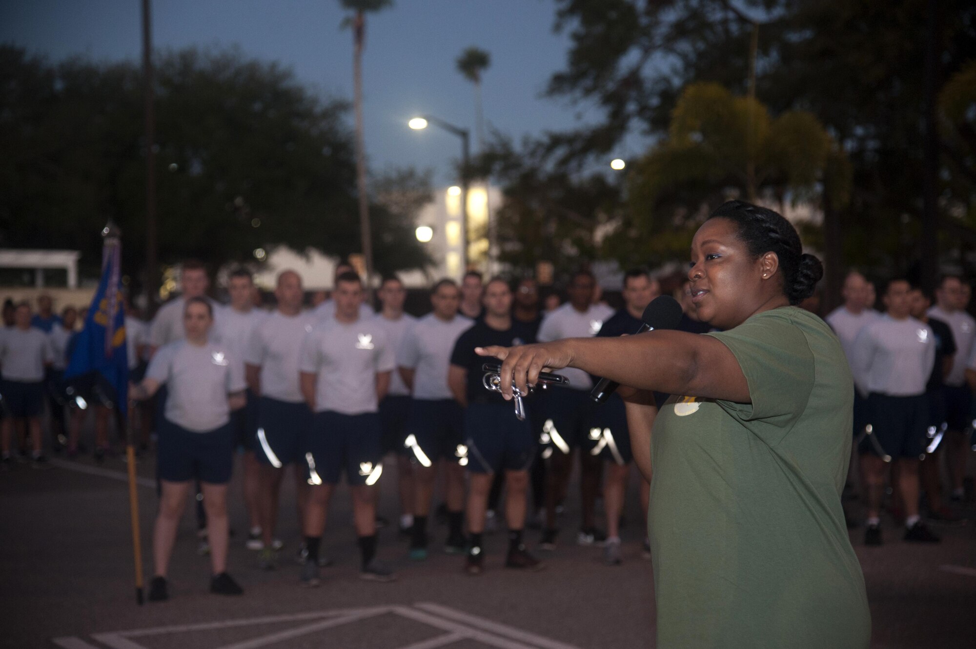 A member of Maj. Raymond Estelle’s family gives closing remarks before the start of the 4th annual 5k and weight lifting competition at MacDill Air Force Base, Fla., Jan. 13, 2017. The event was organized by the 6th Communications Squadron to honor Estelle for paying the ultimate sacrifice. (U.S. Air Force photo by Airman 1st Class Rito Smith) 
