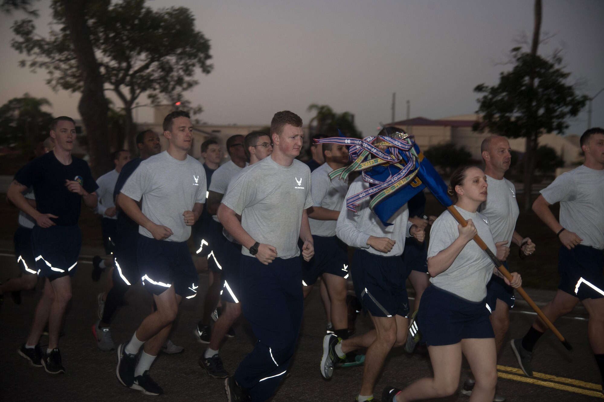 Members of Team MacDill participate in a 5k formation run as part of an event to honor Maj. Raymond Estelle at MacDill Air Force Base, Fla., Jan. 13, 2017. The event started with a 5k formation run around MacDill before the weight lifting competition. (U.S. Air Force photo by Airman 1st Class Rito Smith) 
