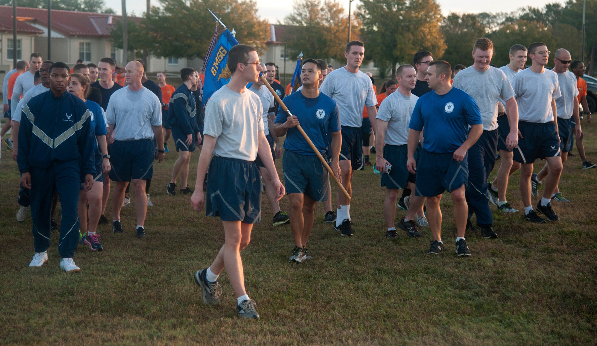 Members of MacDill Air Force Base are dismissed from formation in order to hydrate and rest after the 5k formation run at MacDill Air Force Base, Fla., Jan. 13, 2017. After the run, Airmen were given drinks and a quick break prior to the weight lifting competition. (U.S. Air Force photo by Airman 1st Class Rito Smith) 