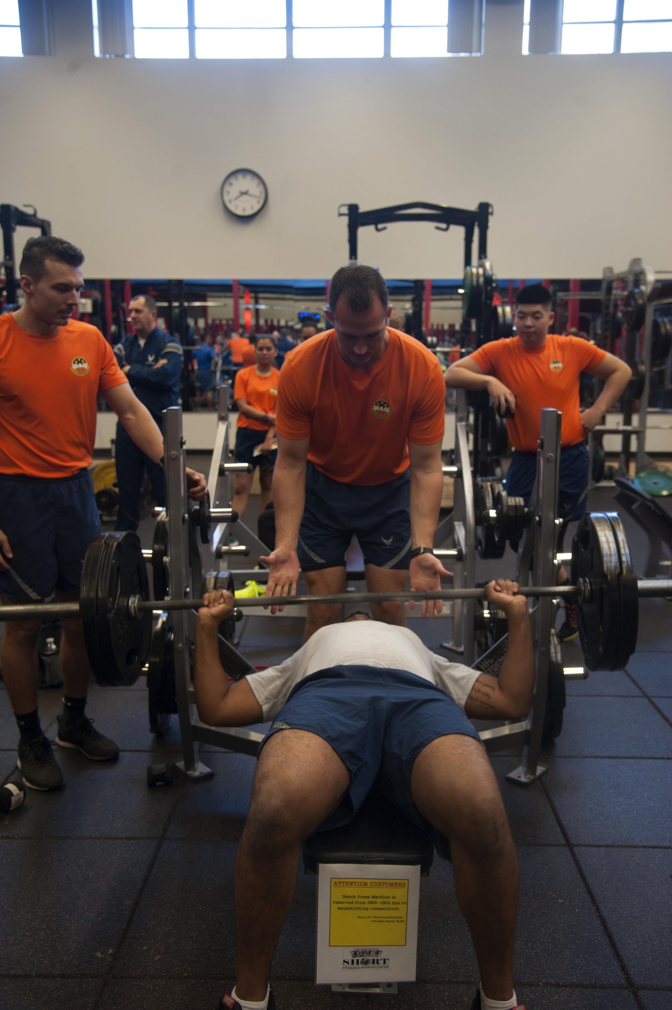 Members of Team MacDill spot an Airman during the weight-lifting portion of the 4th annual 5k and weight lifting competition to honor Maj. Raymond Estelle at MacDill Air Force Base, Fla., Jan. 13, 2017. During the event, participating members were allowed three attempts to see how much weight they could lift. (U.S. Air Force photo by Airman 1st Class Rito Smith) 