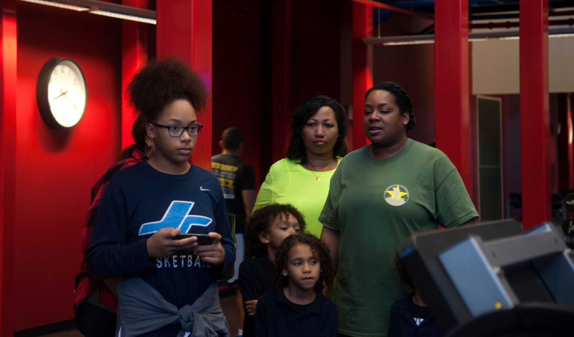 Maj. Raymond Estelle’s family watches as Team MacDill participates in the 4th annual 5k and weight lifting competition to honor Estelle for making the ultimate sacrifice at MacDill Air Force Base Fla., Jan. 13, 2017. The family has attended every event for the last four years. (U.S. Air Force photo by Airman 1st Class Rito Smith) 