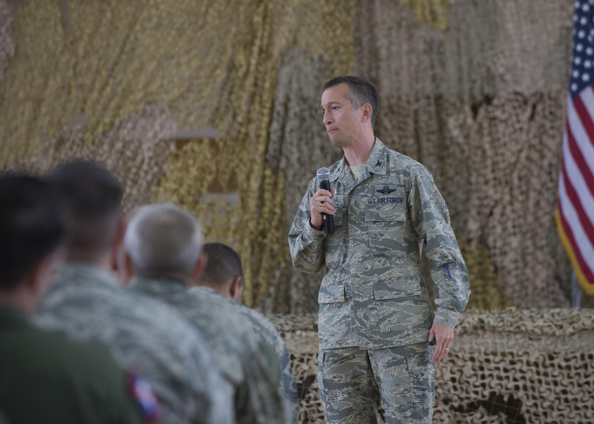 Col. Houston Cantwell, the 49th Wing commander, speaks to Airmen at an all-call on Jan. 3, 2017 at Holloman Air Force Base, N.M. Cantwell discussed the highs and lows of 2016, as well as where the wing is heading for 2017. Specifically, he mentioned the increase in Remotely Piloted Aircraft training and the Wing’s new mission and vision statements. (U.S. Air Force photo by Senior Airman Emily Kenney)