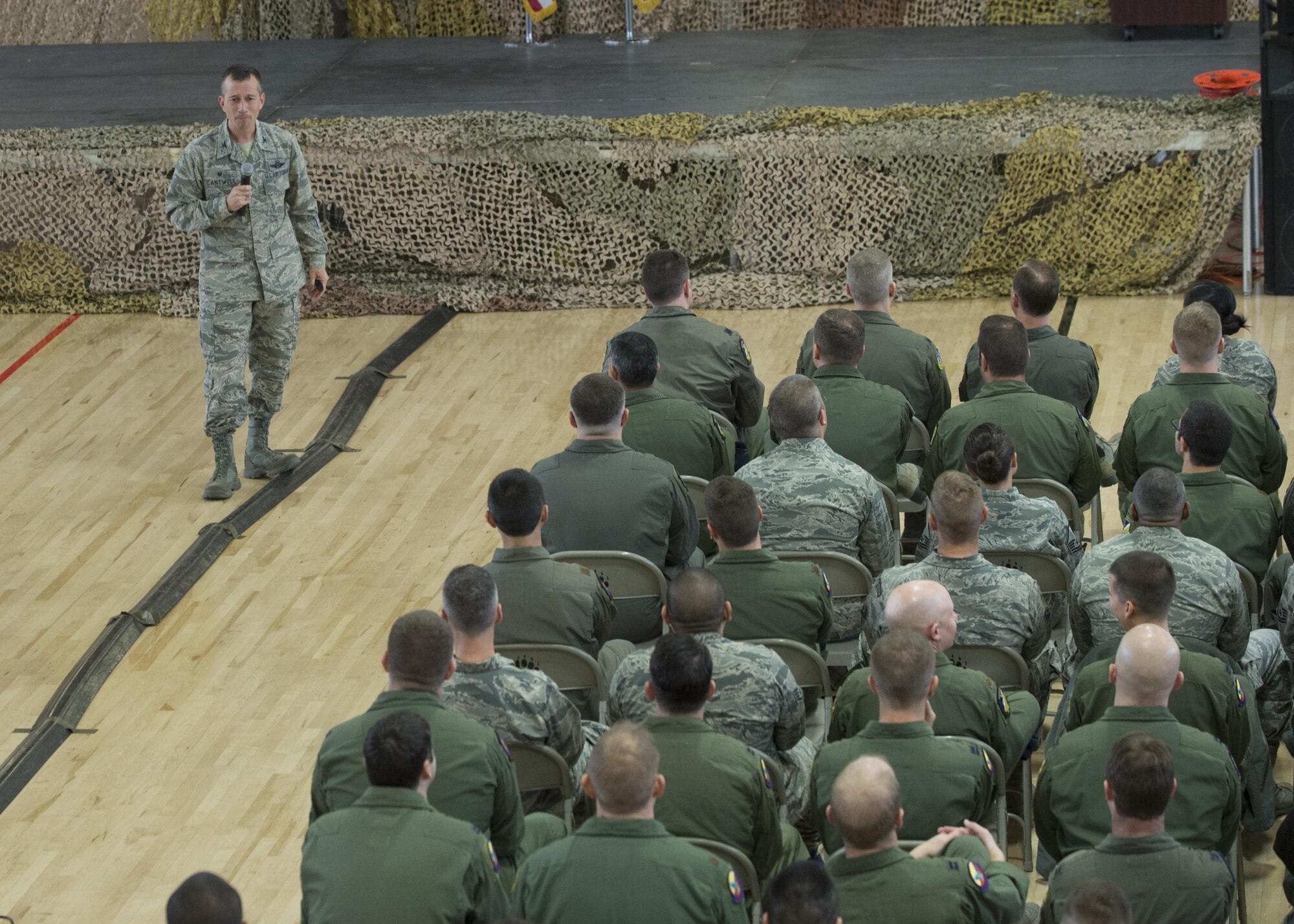 Col. Houston Cantwell, the 49th Wing commander, speaks to Airmen at an all-call on Jan. 3, 2017 at Holloman Air Force Base, N.M.  Cantwell discussed the new wing mission and vision statements, as well as the plan to increase Remotely Piloted Aircraft aircrew training. The all-call ended with questions from the audience. (U.S. Air Force photo by Senior Airman Emily Kenney)