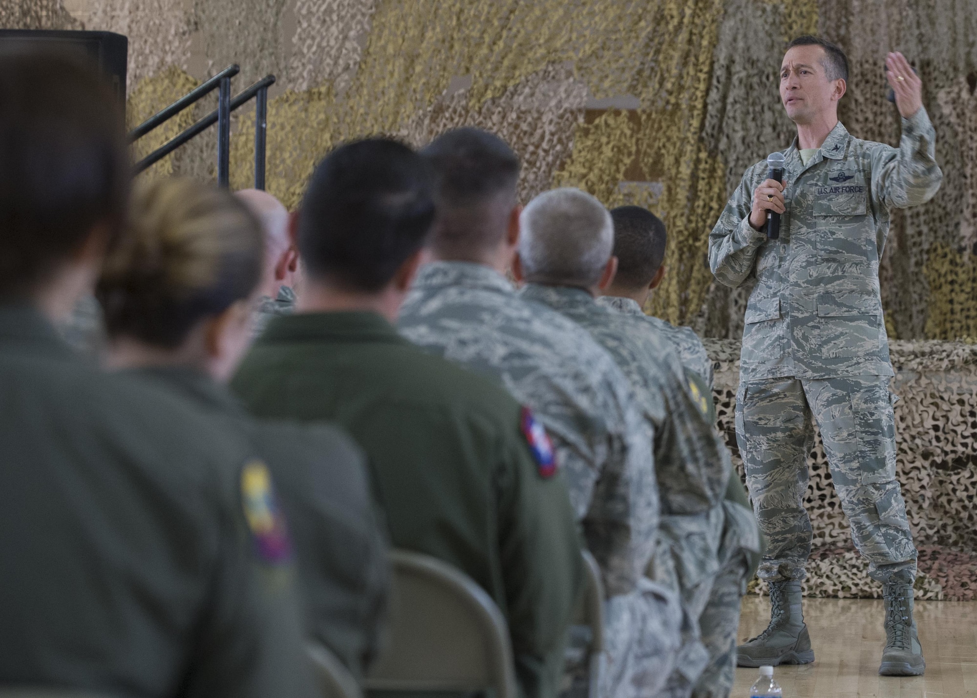 Col. Houston Cantwell, the 49th Wing commander, speaks to Airmen at an all-call on Jan. 3, 2017 at Holloman Air Force Base, N.M.  Cantwell discussed the new wing mission and vision statements, as well as the plan to increase Remotely Piloted Aircraft aircrew training. The all-call ended with questions from the audience. (U.S. Air Force photo by Senior Airman Emily Kenney)