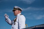 170106-N-KC128-0092 JOINT BASE PEARL HARBOR-HICKAM, Hawaii (January 6, 2017) Capt. Michael Martin, commanding officer of Naval Submarine Training Center, Pacific, renders honors during a change of command ceremony on Joint Base Pearl Harbor-Hickam. Capt. Andrew Hertel relieved Martin as commanding officer of Naval Submarine Training Center, Pacific. (U.S. Navy photo by Mass Communication Specialist 1st Class Daniel Hinton)