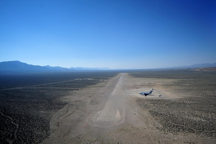 A U.S. Air Force C-17 Globemaster III from Charleston Air Force Base prepares to take off from a dirt landing strip while supporting the Air Force Weapons School over Nellis Air Force Base, Nev., May 23, 2012. The Air Force Weapons School is a five-and-a-half-month training course which provides selected officers with the most advanced training in weapons and tactics employment. Throughout the course, students receive an average of 400 hours of post graduate-level academics and participate in demanding combat training missions.