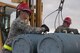 U.S. Air Force Senior Airman Jeremiah Hartbarger, left, and, and Airman 1st Class Eli Miller, right, both 7th Munitions Squadron green team members, load a pair of inert GBU-31 V1 joint direct attack munitions onto a munitions trailer at Dyess Air Force Base, Texas, Jan. 12, 2017. As part of the competition, both teams of Airmen had to assemble four inert GBU-31 V1 JDAMs and 15 BDU-50 low-drag munitions as quickly and accurately as possible. (U.S. Air Force photo by Airman 1st Class Rebecca Van Syoc)