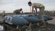 U.S. Air Force Airmen from the 7th Munitions Squadron green team assemble four GBU-31 V1 joint direct attack munitions at Dyess Air Force Base, Texas, Jan. 12, 2017. Two teams of nine Airmen each took part in the quarterly competition, in order to show off both technical prowess and team camaraderie within the squadron. (U.S. Air Force photo by Airman 1st Class Rebecca Van Syoc)