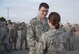U.S. Air Force Staff Sgt. Chris Kirby, left, 7th Munitions Squadron green team member, accepts a certificate from Capt. Emily Barielle, right, 7th MUNS operation officer, at Dyess Air Force Base, Texas, Jan. 12, 2017. The green team won the 7th MUNS quarterly bomb build competition earning the winning Airmen a certificate, one-day pass, and bragging rights until the next quarterly competition. (U.S. Air Force photo by Airman 1st Class Rebecca Van Syoc)