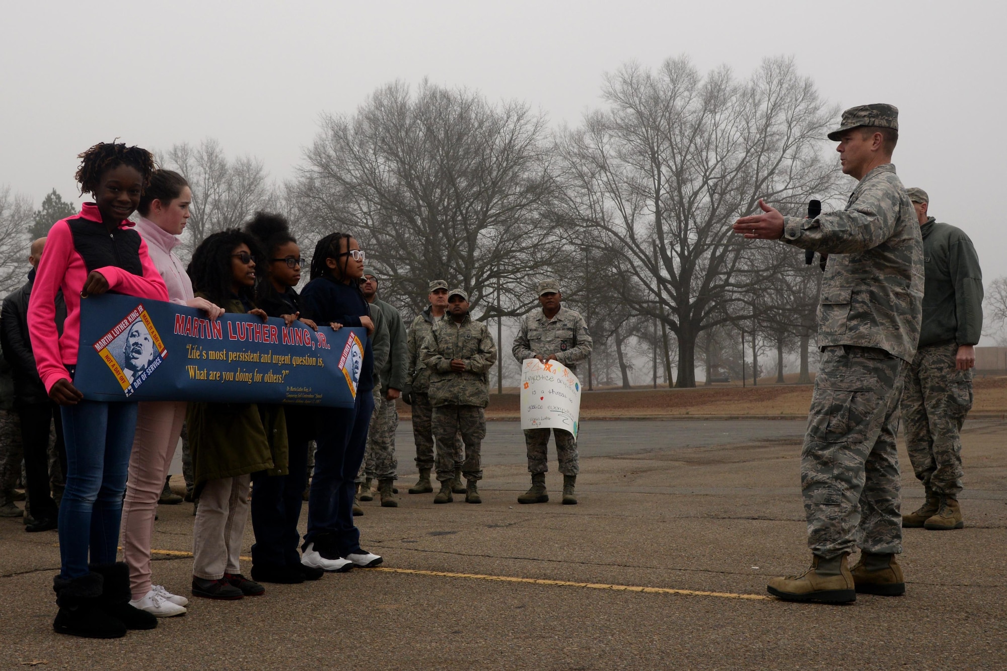 U.S. Air Force Col. Charles Brown, 19th Airlift Wing commander, kicked off the Martin Luther King Jr. commemorative walk with opening remarks January 13, 2017, at Little Rock Air Force Base, Ark. The event began at the Herk Hall and participants marched to the nearby Walters Community Support Center. (U.S. Air Force photo by Airman 1st Class Codie Collins) 