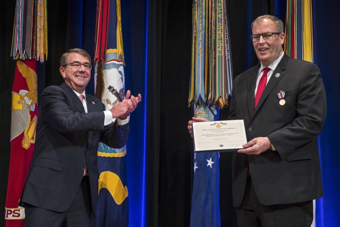 Defense Secretary Ash Carter hosts a farewell ceremony for Deputy Defense Secretary Bob Work at the Pentagon, Jan. 13, 2017. DoD photo by Army Sgt. Amber I. Smith