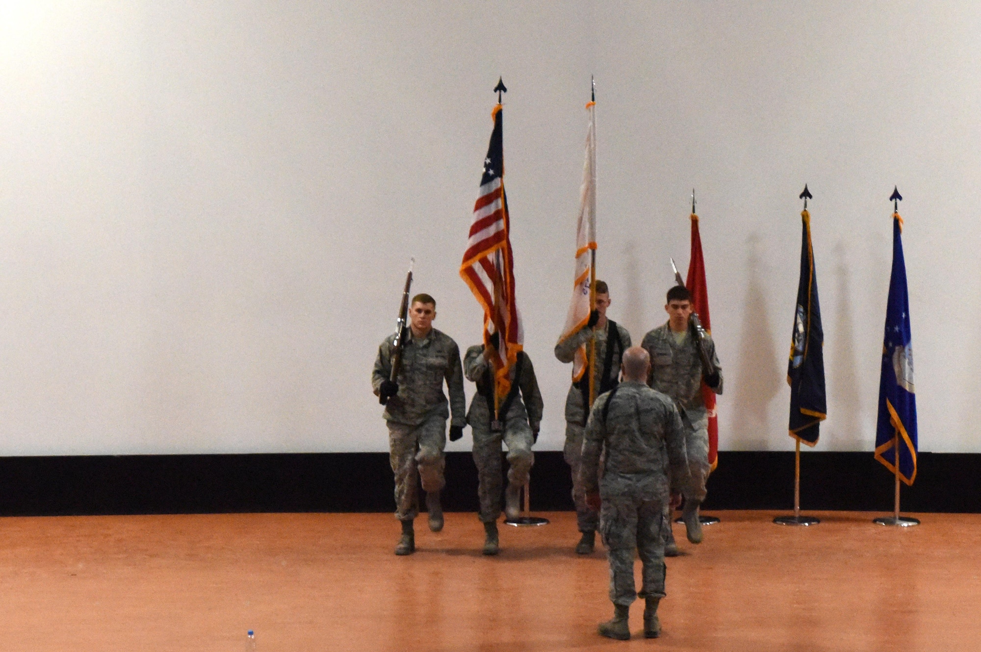 The Al Udeid Air Base Honor Guard practices in the Coalition Compound Theater at Al Udeid AB, Qatar, Nov. 28, 2016. The base honor guard has served countless hours of their time to uphold time honored traditions of reverence and selfless service. (U.S. Air Force photo by Senior Airman Cynthia A. Innocenti)