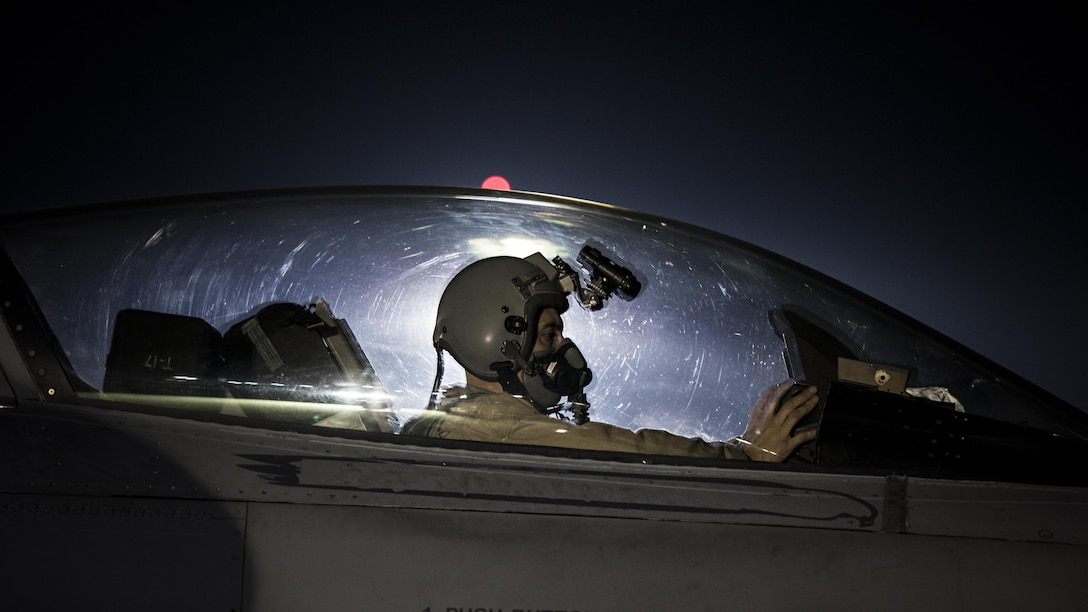 Capt. David, 79th Expeditionary Fighter Squadron pilot, taxis an F-16 Fighting Falcon before a night mission Jan. 13, 2017 at Bagram Airfield, Afghanistan. To become a pilot, David went to school while working as a maintainer, through a deployment to Balad Airfield, Iraq and temporary duties where he was often gone for three weeks out of every month. (U.S. Air Force photo by Staff Sgt. Katherine Spessa)
