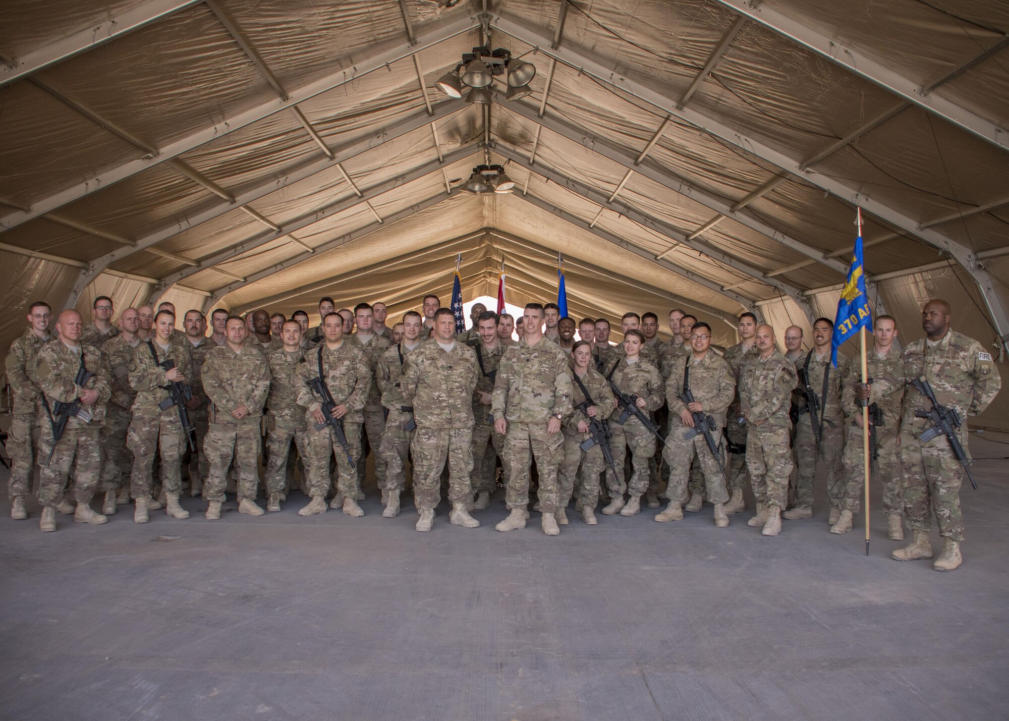 370th Air Expeditionary Advisory Group Detachment 1 Airmen pose for a photograph after the change of command ceremony, Jan. 8, 2017 at Al Asad Air Base, Iraq. (U.S. Air Force photo/Senior Airman Andrew Park)