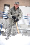 Col. Jeffery D. Aebischer, Vice Wing Commander of the 124th Fighter Wing, helps with snow removal alongside other Airmen on base during the record-setting snowstorm that swept through Boise, Idaho in the early weeks of Jan. 2017.