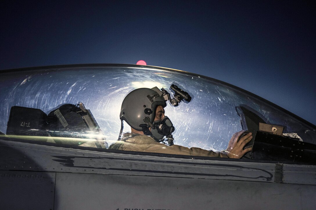 An Air Force captain taxis an F-16 Fighting Falcon before a night mission at Bagram Airfield, Afghanistan, Jan. 13, 2017. Air Force photo by Staff Sgt. Katherine Spessa 