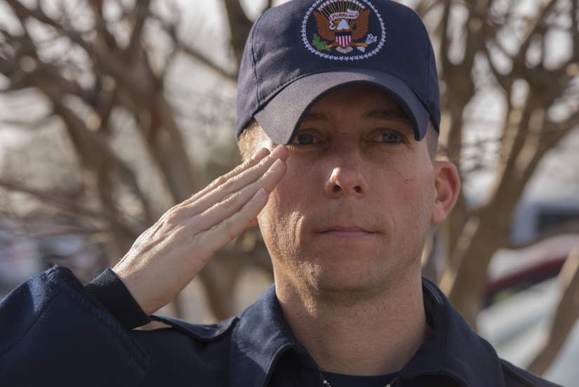 Tech. Sgt. Steven Conine, inaugural parade street cordon member, salutes at Joint Base Andrews, Md., Jan. 12, 2017. He and many other JBA members attended the cordon rehearsal, where they practiced marching, saluting, and standing at attention for the 58th Presidential Inaugural Parade. (U.S. Air Force photo by Airman 1st Class Valentina Lopez)