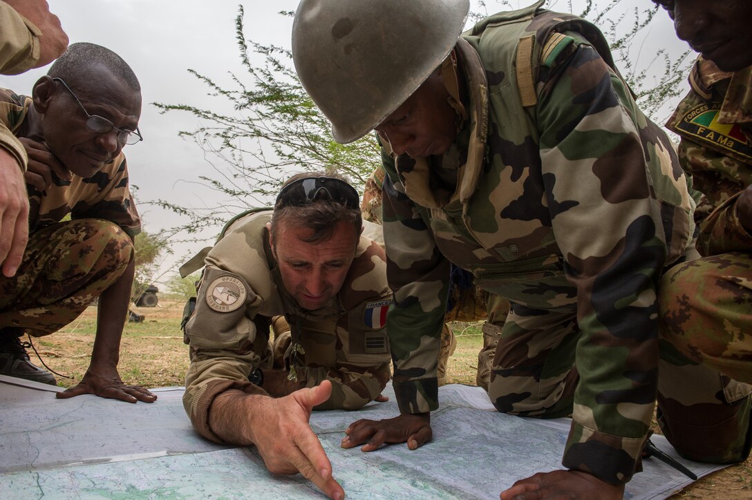 A French soldier works with African military leaders as part of Operation Barkhane. French Ministry of Defense photo