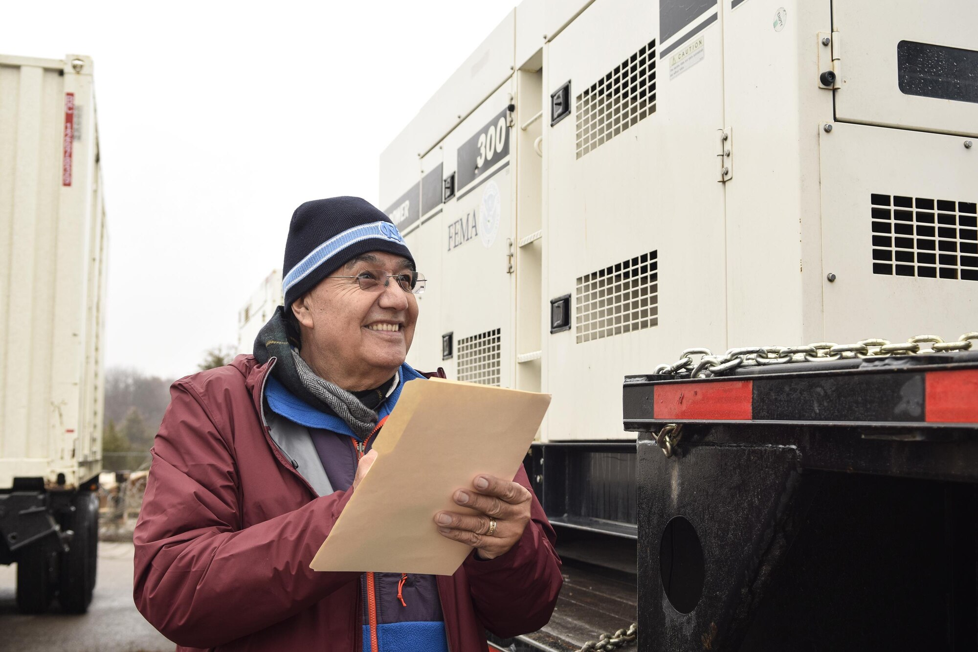 Hector G. Rodriguez, Federal Emergency Management Agency accountable property officer, inventories massive electrical generators delivered to the Glenwood Training Area Jan. 15, 2017, Tinker Air Force Base, Oklahoma. FEMA established an Incident Support Base where emergency assets and FEMA personnel like Rodriguez, who lives in Gardena, California, stage in response to the ongoing ice storm impacting the Central Plains region of the U.S. FEMA and the 72nd Air Base Wing have an agreement in place to use Tinker AFB due to its strategic location where two major interstate highways intersect along with a robust base infrastructure such as an 11,000 foot runway and cargo-handling facility. (U.S. Air Force photo/Greg L. Davis)