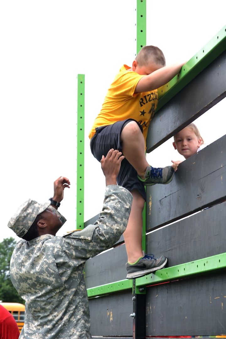 DLA Troop Support active duty personnel were among nearly 40 military personnel to help local children complete seven obstacle courses during the Philly Play Summer Challenge August 10, 2016  in Northeast Philadelphia. More than 2,000 local children participated in the event, aimed at encouraging teamwork and physical fitness.