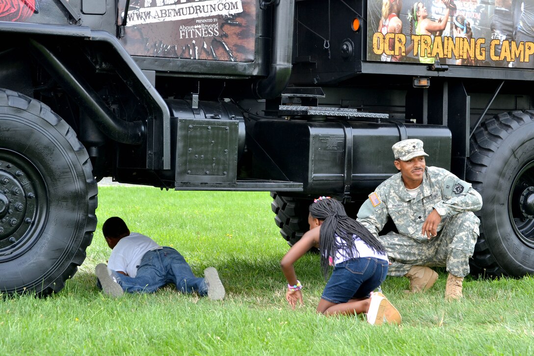 DLA Troop Support active duty personnel were among nearly 40 military personnel to help local children complete seven obstacle courses during the Philly Play Summer Challenge August 10, 2016 in Northeast Philadelphia. More than 2,000 local children participated in the event, aimed at encouraging teamwork and physical fitness.