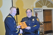 Maj. Gen. Jeffrey Snow (left), commanding general, U.S. Army Recruiting Command and Jimmy Reyes (right), deputy chief, San Antonio Police Department, celebrate the Partnership for Youth Success (PaYS) program signing agreement, Jan. 6, Marriott Plaza Hotel, San Antonio.