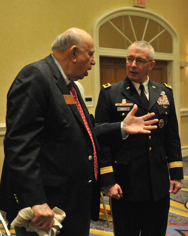 Olin Brewster (left), U.S. Army Reserve ambassador, 63rd Regional Support Command, talks with Maj. Gen. Michael Smith, deputy chief, U.S. Army Reserve about the benefits of the Partnership for Youth Success (PaYS) program agreement, signed Jan. 6, Marriot Plaza Hotel, San Antonio.