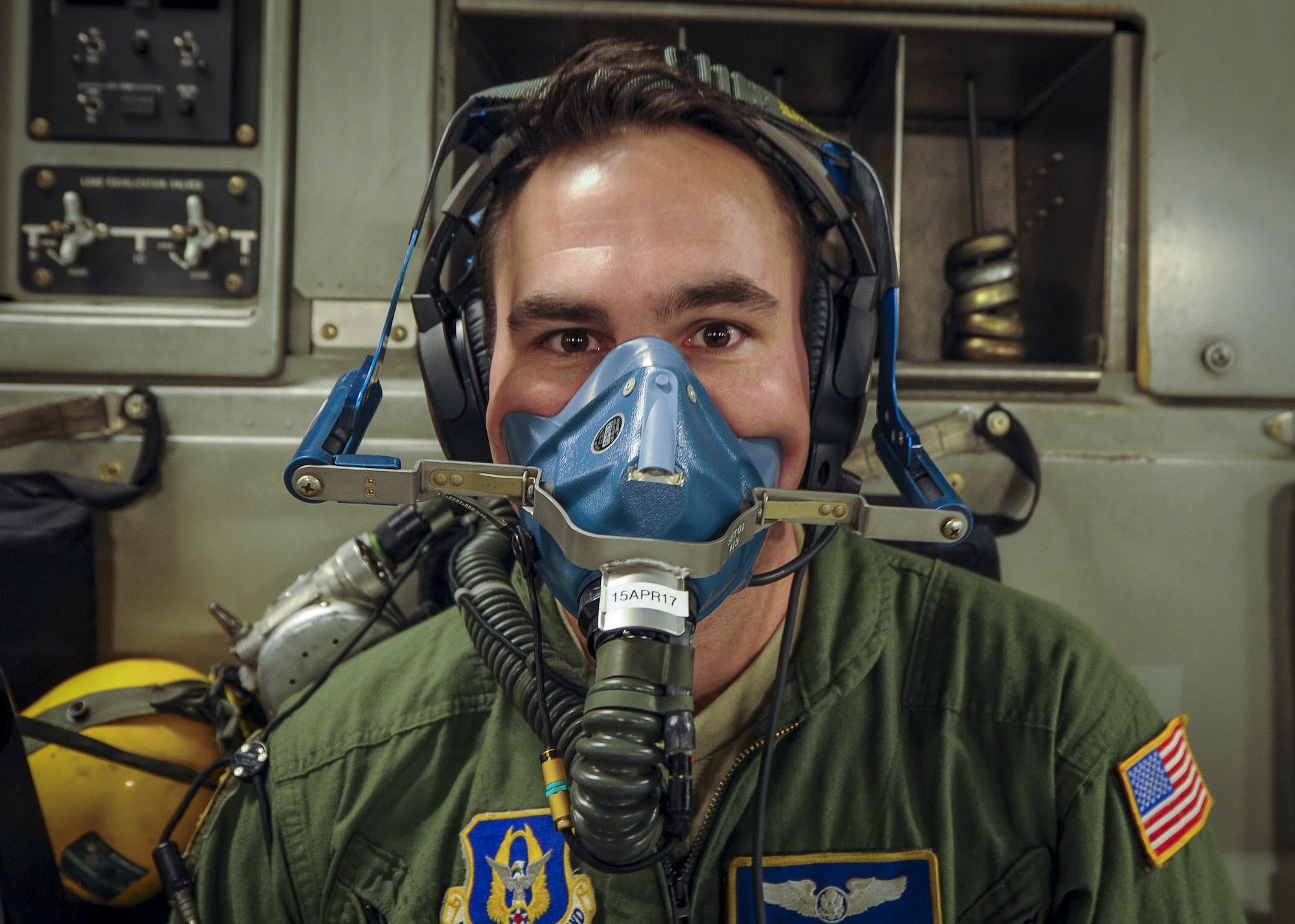 Senior Airman Josh Lykins, 315th Aeromedical Evacuation Squadron medical technician, tests emergency equipment during a medical training exercise January 13, 2017, while on board a C-17 Globemaster III bound for Ramstein Air Force Base, Germany. Airmen from the 315th AES are able to conduct medical training, while in conjunction with real-world operations. (U.S. Air Force photo by Senior Airman Tom Brading)