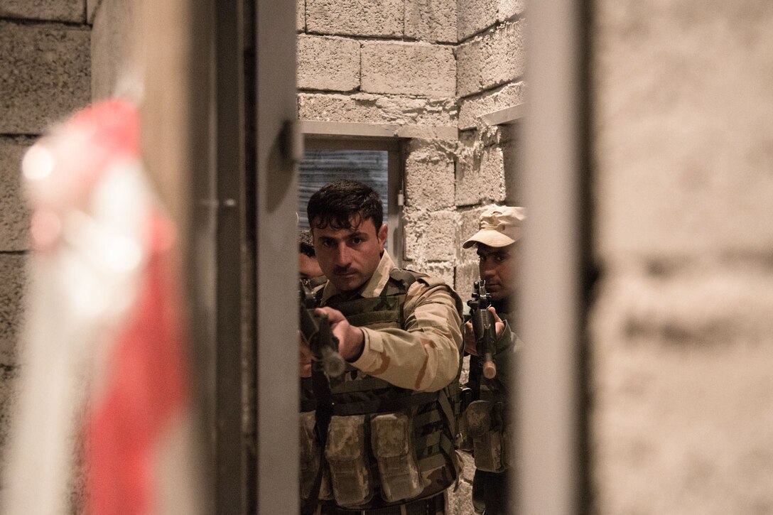 Peshmerga soldiers practice urban room clearing during training at Bnaslawa, Iraq, Jan. 10, 2017. The training was conducted as part of the overall Combined Joint Task Force – Operation Inherent Resolve’s building partner capacity mission CJTF-OIR is the global Coalition to defeat ISIL in Iraq and Syria. (U.S. Army photo by Spc. Ian Ryan)