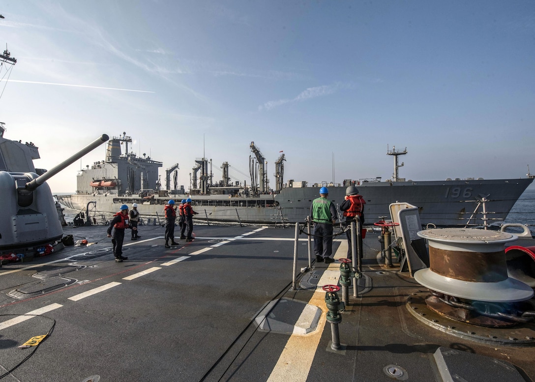 170111-N-CS953-082
ARABIAN SEA (Jan. 11, 2017) The Arleigh Burke-class guided-missile destroyer USS Mahan (DDG 72) pulls alongside the fleet replenishment oiler USNS Kanawha (T-AO 196) during a replenishment-at-sea. Mahan is deployed in the U.S. 5th Fleet area of operations in support of maritime security and theater security operation efforts. (U.S. Navy photo by Mass Communication Specialist 1st Class Tim Comerford/Released)