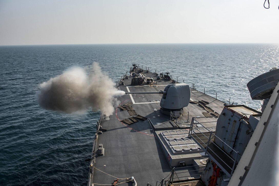 170111-N-CS953-086
ARABIAN SEA (Jan. 11, 2017) The Arleigh Burke-class guided-missile destroyer USS Mahan (DDG 72) fires its Mark 45 5-inch gun during a pre-action calibration firing. Mahan is deployed in the U.S. 5th Fleet area of operations in support of maritime security and theater security operation efforts. (U.S. Navy photo by Mass Communication Specialist 1st Class Tim Comerford/Released)
