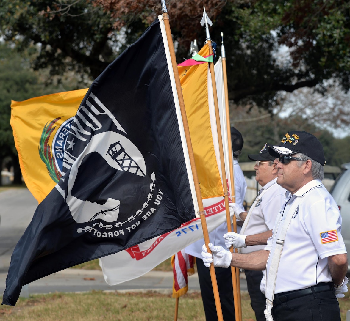 Members of the Fort Sam Houston Memorial Services Detachment Honor Guard hold the POW/MIA and other flags during the service for Cpl. Luis Patlan Torres at the Fort Sam Houston National Cemetery Jan. 13.