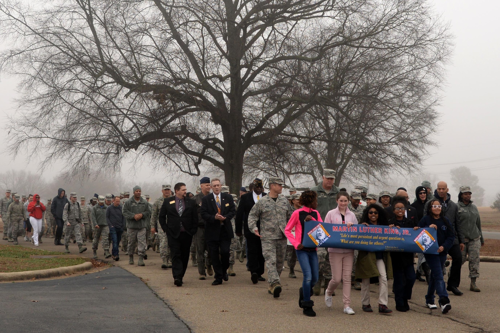 Team Little Rock members march in unity to remember Martin Luther King Jr. January 13, 2017, at Little Rock Air Force Base, Ark. The event began at the Herk Hall on base and participants marched to the nearby Walters Community Support Center. (U.S. Air Force photo by Airman 1st Class Codie Collins)
