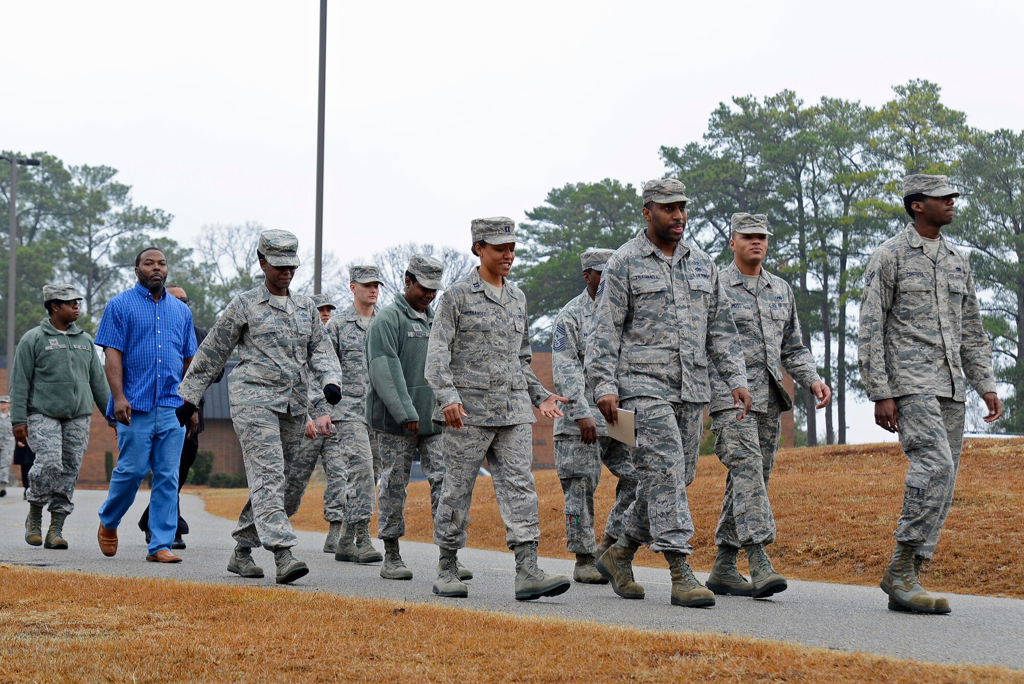 Team Shaw members take a walk around Memorial Lake in remembrance of Dr. Martin Luther King Jr. at Shaw Air Force Base, S.C., Jan. 17, 2016. After the walk, Team Shaw members gathered at the Palmetto Chapel to listen to a guest speaker as well as a song honoring King’s contributions such as his political activism addressing segregation laws and discrimination. (U.S. Air Force photo by Airman 1st Class BrieAnna Stillman) 