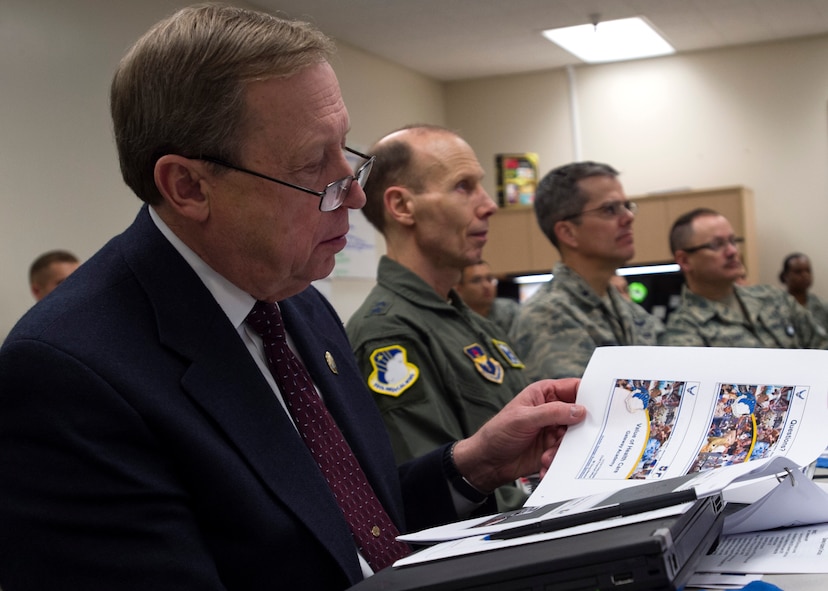 Dr. Brent James, an internationally known expert in the field of clinical quality improvement, reviews a handout during a Jan. 11 briefing in the Gateway Academy at the Wilford Hall Ambulatory Surgical Center, Joint Base San Antonio-Lackland, Texas. James learned about the 59th Medical Wing’s work toward continuous process improvement and becoming a high reliability organization. He is the executive director of the Institute for Health Care Delivery Research and vice president, Medical Research and Continuing Medical Education at Intermountain Healthcare in Salt Lake City, Utah. (U.S. Air Force photo/Staff Sgt. Kevin Iinuma)