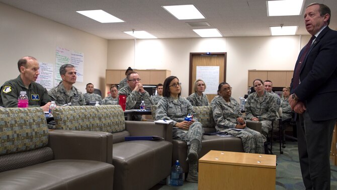 Dr. Brent James (right) provides feedback during a Jan. 11 briefing at the Gateway Academy in the Wilford Hall Ambulatory Surgical Center, Joint Base San Antonio-Lackland, Texas. James learned about the 59th Medical Wing’s innovative continuous process improvement programs and work toward becoming a high reliability organization. James is executive director of the Institute for Health Care Delivery Research, and vice president, Medical Research and Continuing Medical Education at Intermountain Healthcare in Salt Lake City, Utah.  (U.S. Air Force photo/Staff Sgt. Kevin Iinuma)