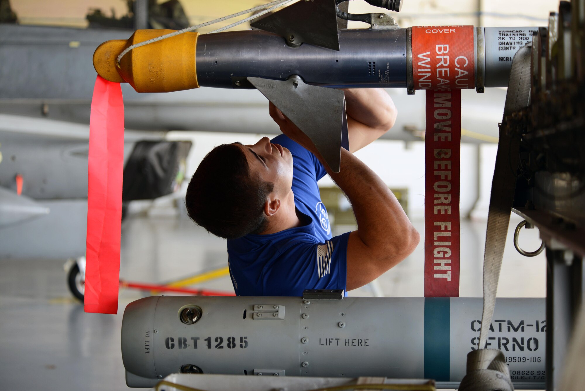U.S. Air Force Airman 1st Class Dillon Litteral, 20th Aircraft Maintenance Squadron weapons load crew member, checks argon serviceability on a munition at Shaw Air Force Base, S.C., Jan. 13, 2017. The gas is responsible for cooling the munition’s seeker head which guides the missile. (U.S. Air Force photo by Airman 1st Class Kathryn R.C. Reaves)