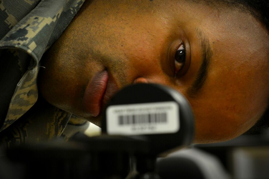U.S. Air Force Senior Airman Isaias Tesfaslassie, 20th Component Maintenance Squadron precision measurement equipment laboratory journeyman, uses a repeat reading gauge at Shaw Air Force Base, S.C., Dec. 21, 2016. Repeat reading gauges are used to measure how flat a surface is. (U.S. Air Force photo by Airman 1st Class Destinee Sweeney)